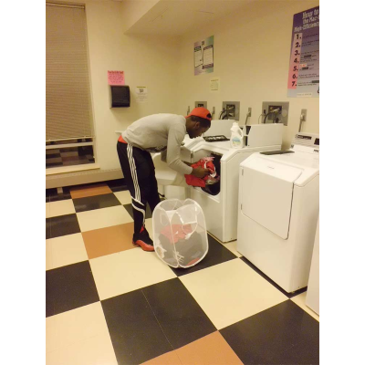 Student using washer