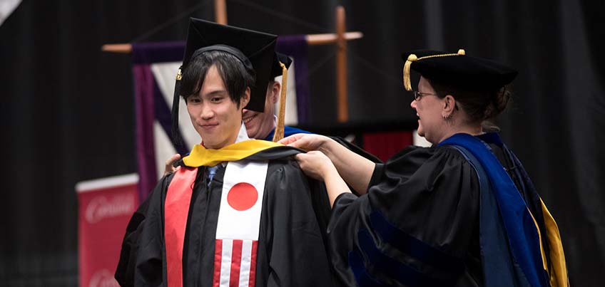 Graduate student receiving hood