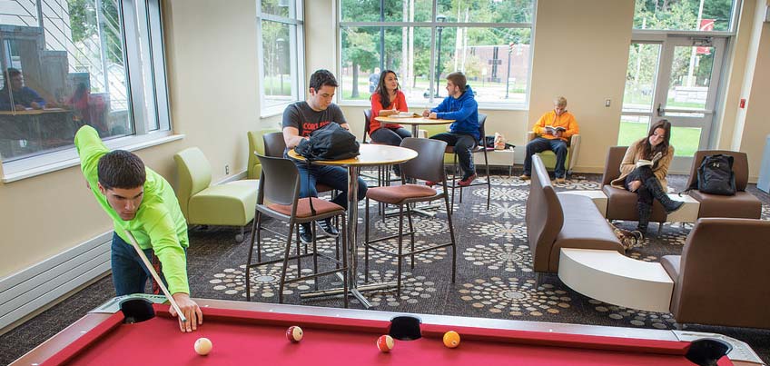Students hanging in the common area of Dragon Hall