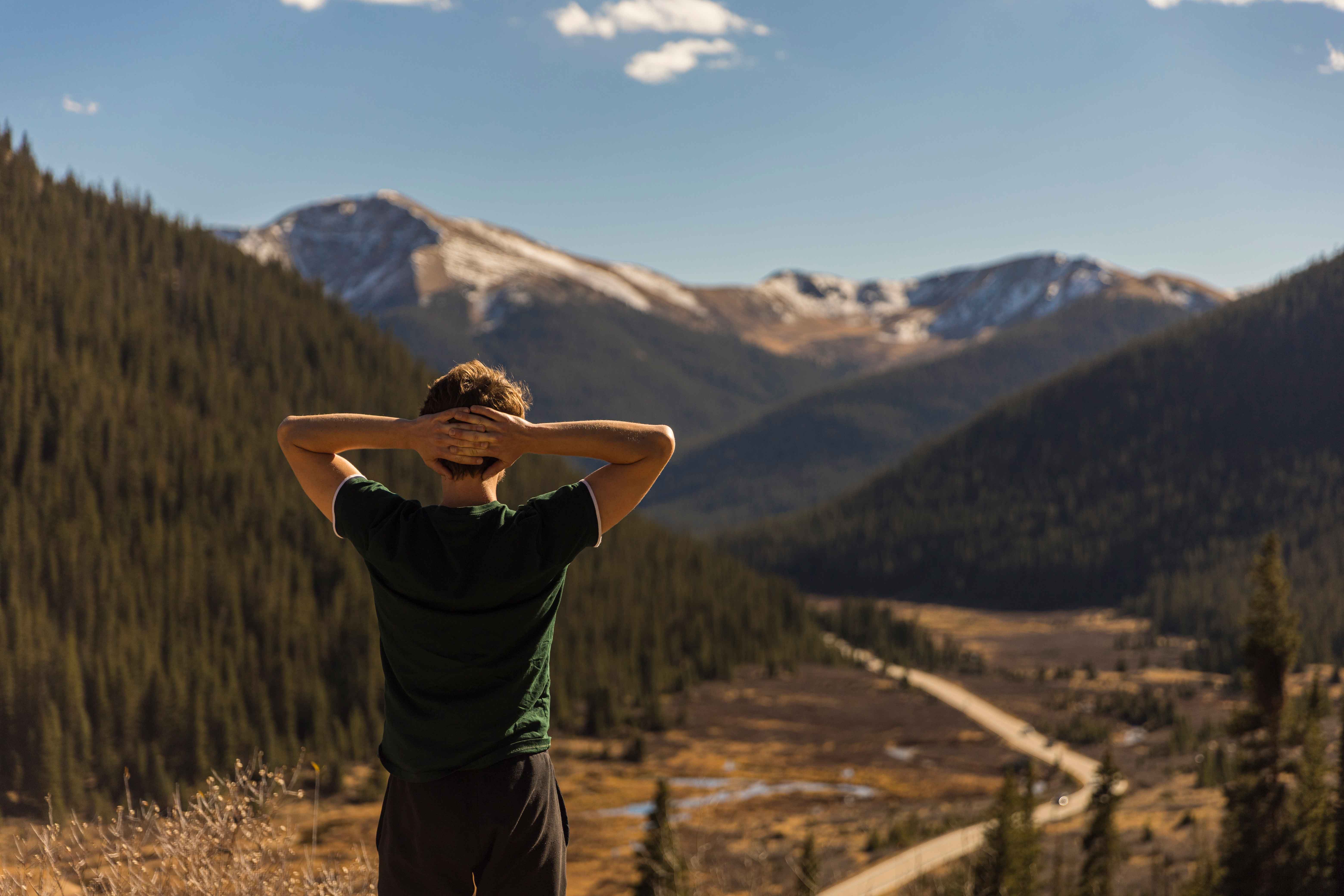 Student looking out at mountains in Colorado