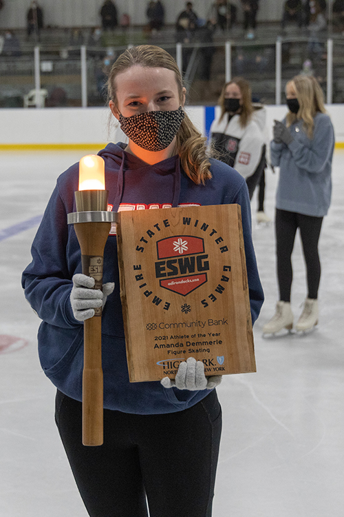 Amanda Demmerle with ESWG torch and Athlete of the Year plaque