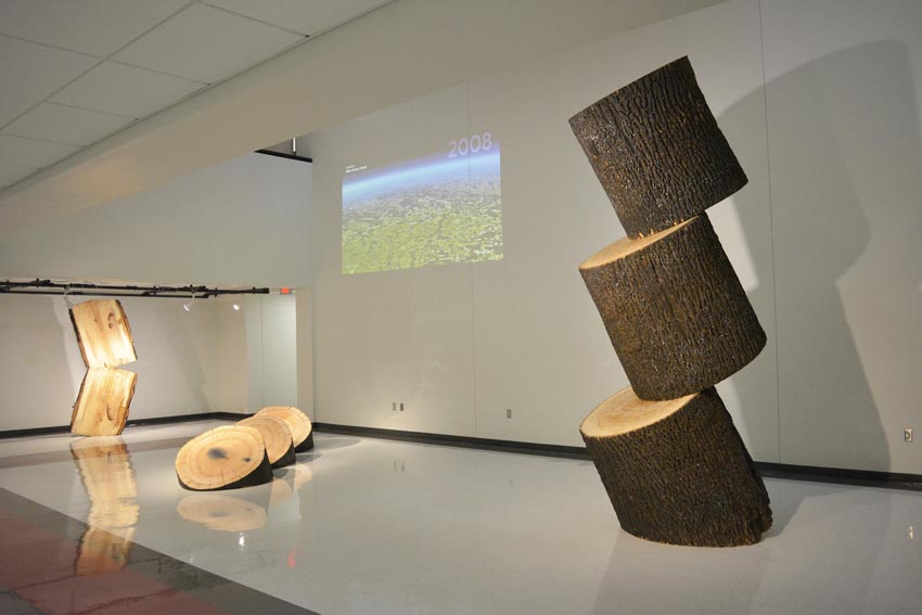 View into the Critique Space/Sculpture Pit at Dowd Fine Arts Center featuring large-scale objects produced by Ithaca-based sculptor Jack Elliott.