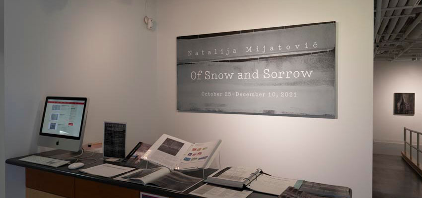 Dowd Gallery reception area, featuring a banner with the name of the show