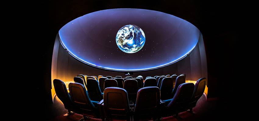 Fish-eye view of the planetarium dome and seating