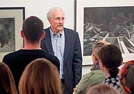 Photo of artist speaking in Dowd Gallery