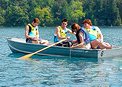 Photo of students taking water samples