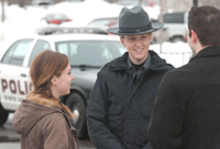 Police officer speaking with students
