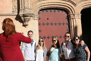 snapping a photo of students studying abroad