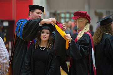 hooding at Graduate Commencement