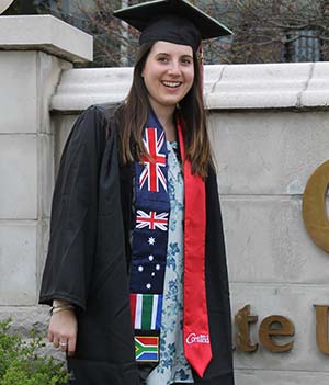 Female student wearing an international stole
