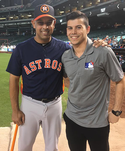 Alex Cora and Javier Román