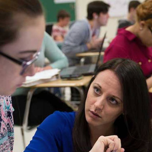 English Teacher in a high school classroom