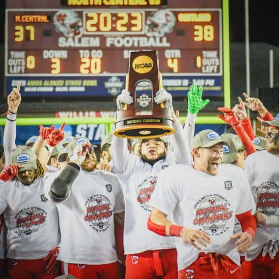 Football team with their National Championship trophy