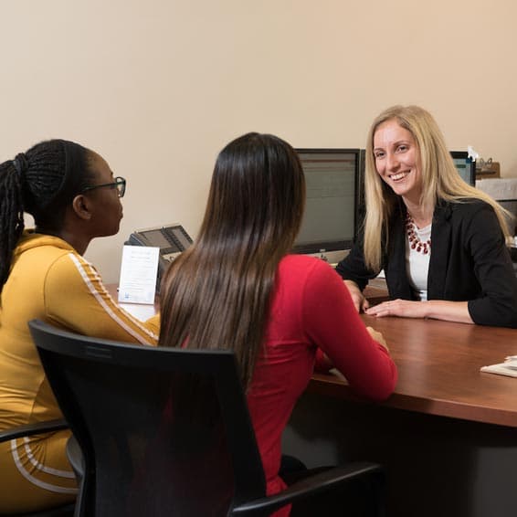 Students speaking with the Financial Aid Office