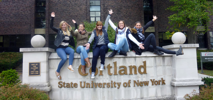 Visiting Students on Cortland Sign
