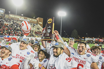 Football earns first-ever national title in thriller