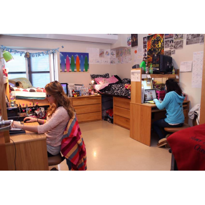Students studying in bedroom