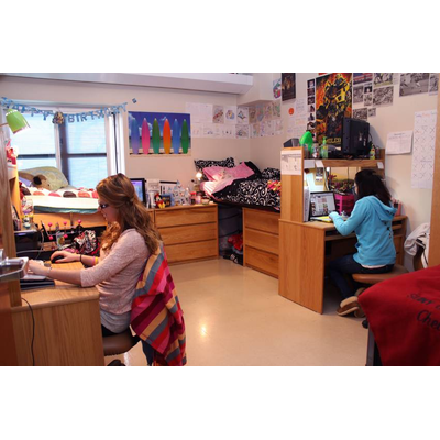 Students studying in bedroom