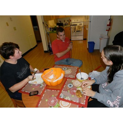 Students Sit at Dining Table