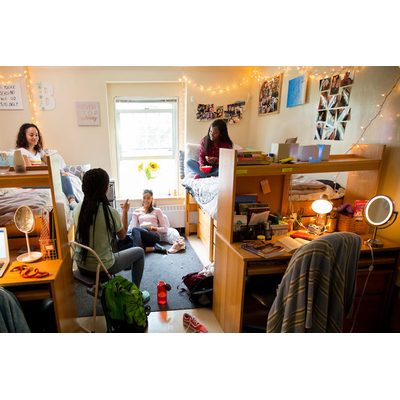 Students talking in bedroom