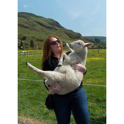 Student holding lamb