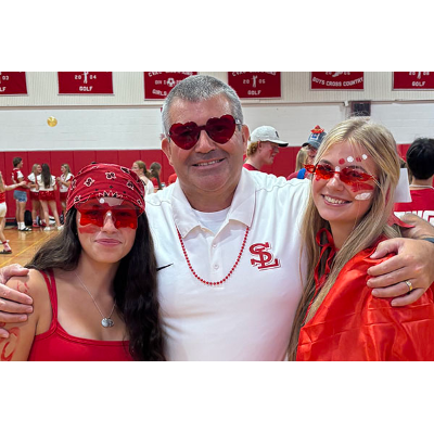 Dann celebrates with former students at Homecoming 2025