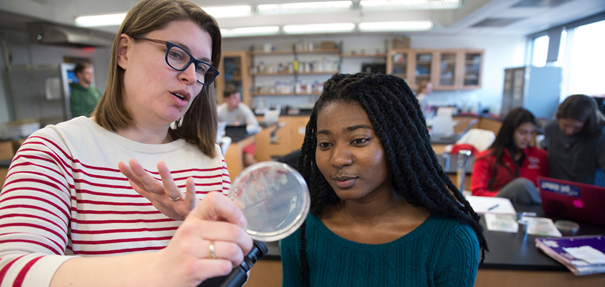 Associate Professor Christa Chatfield working in a lab with a student