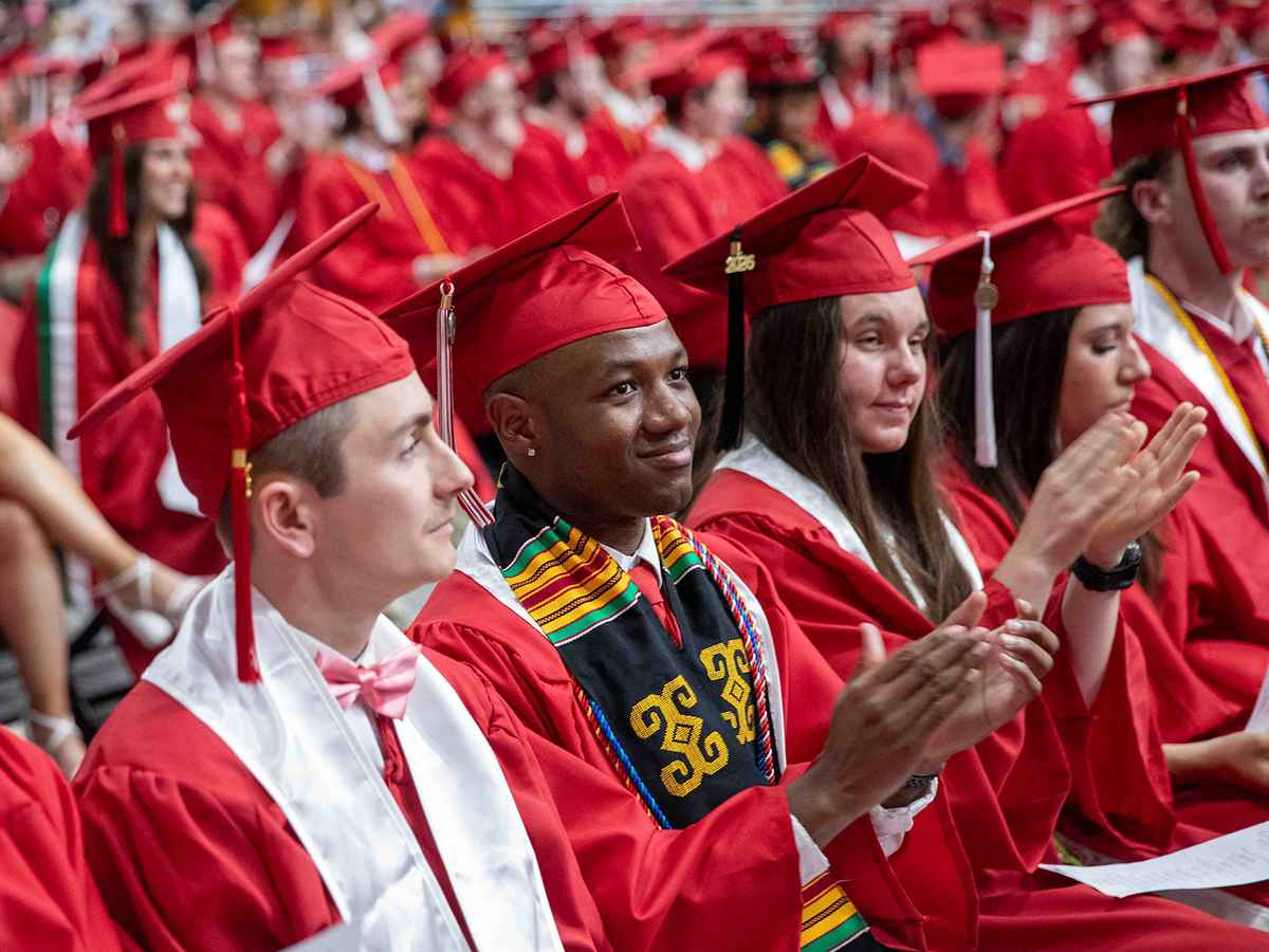 2026 graduates clapping at Undergraduate Commencement