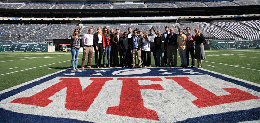 Sport Management Faculty and Students on the field at Met Life Stadium