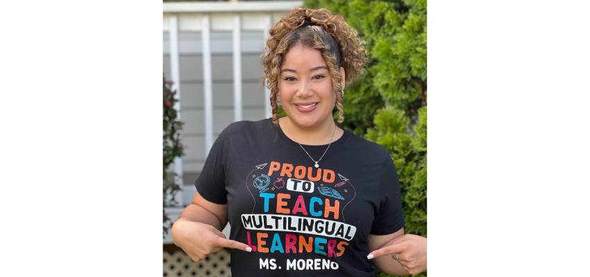 Alyssa Moreno with Proud to Teach Multilingual Learners shirt outside