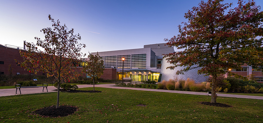 Exterior image of front of Bowers Hall at dusk