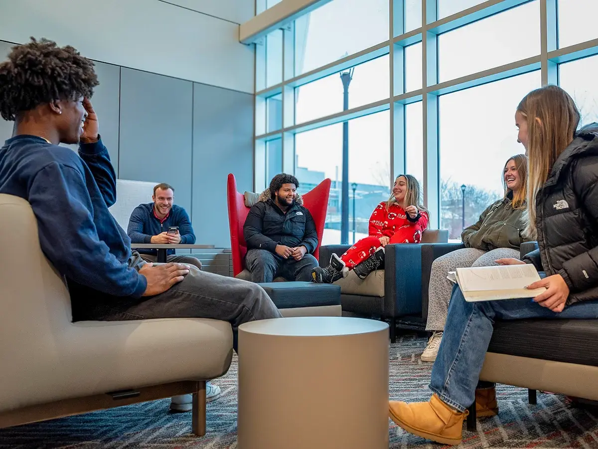 students hanging out in a common space of the newly renovated Cornish-Van Hoesen Hall