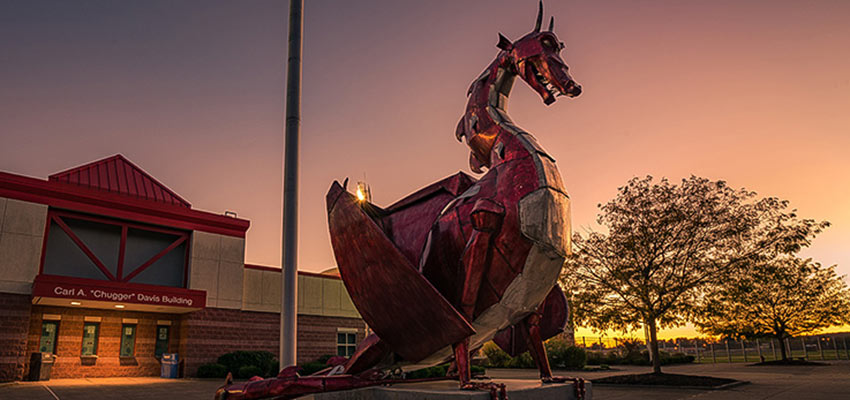 Red Dragon Sculpture at sunset