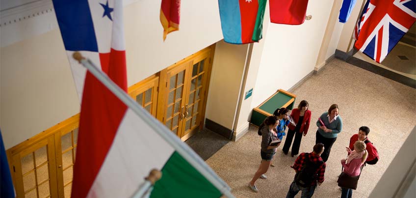 International students chatting in Old Main