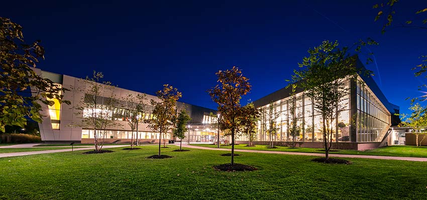 Student Life Center at night with lights on