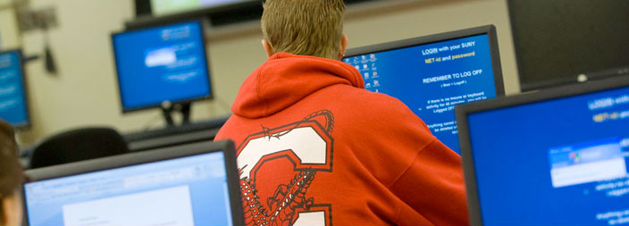 A SUNY Cortland student working in a computer lab