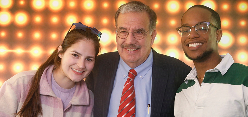 President Bitterbaum poses with two students at Senior Send-Off