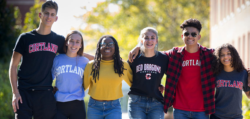 Students together on the sidewalk leading to Bowers Hall