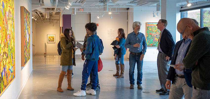 Students and communities at an event in the art gallery