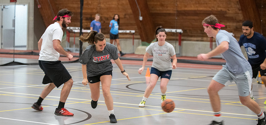 Students playing kickball in an intramural league