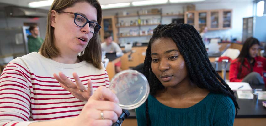 Biological Sciences Department faculty member Christa Chatfield works with Kadeeja Fredankey '16, a former biomedical sciences major