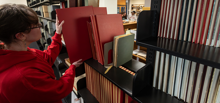 Student pulls books from library rare archives