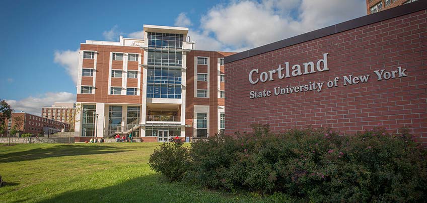 Dragon Hall and SUNY Cortland sign