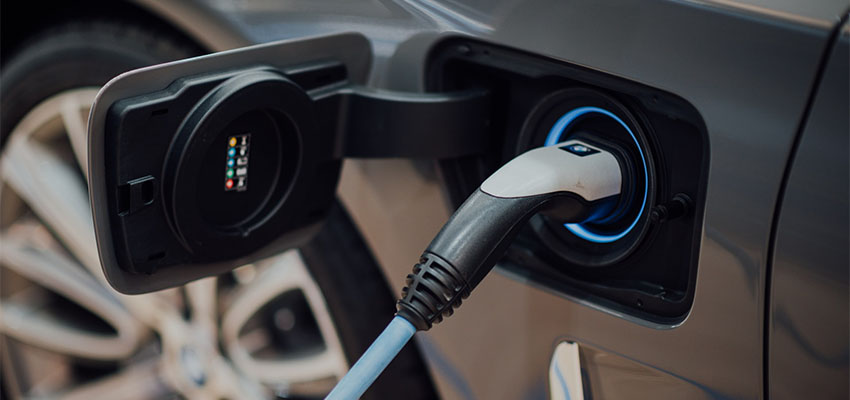 Electric Vehicle charging - Photo by chuttersnap on Unsplash