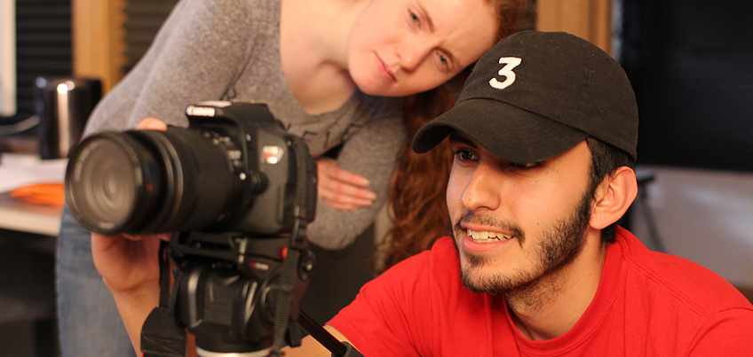Students bring a digital camera into focus