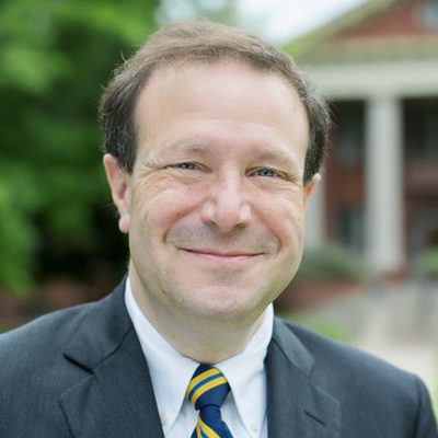 Portrait of Steven Poskanzer in a shirt and tie