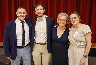 Walsh family photo with four people posed