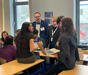 Ava Graziano (left foreground) in discussions with other heads of government in the EU Council.  