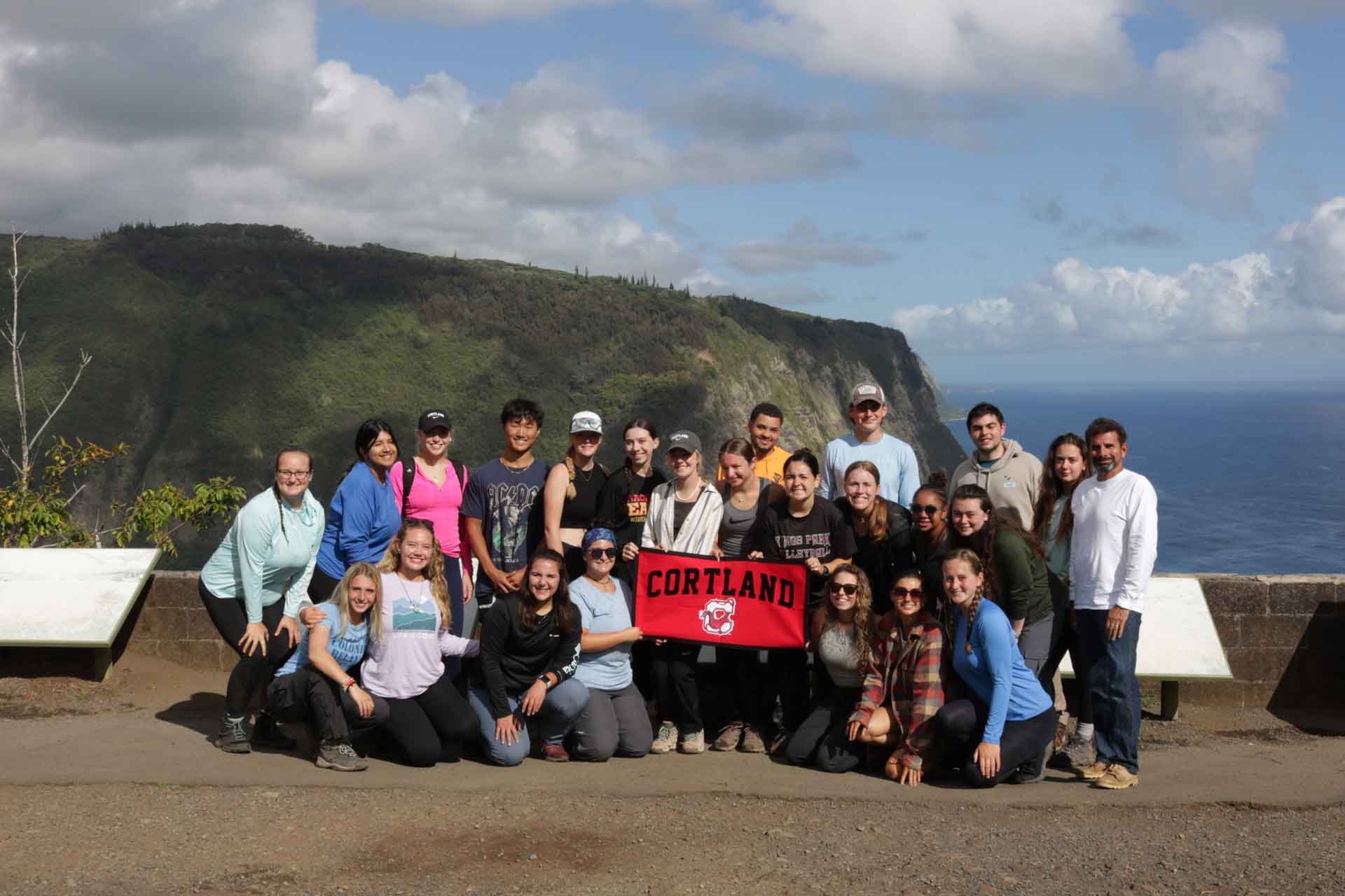 Hawaii ecotourism class pictured with Cortland banner