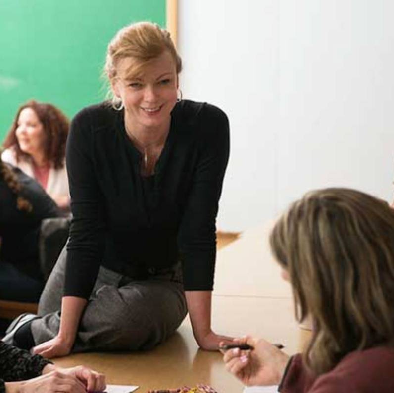 Health teacher speaking to students in a classroom